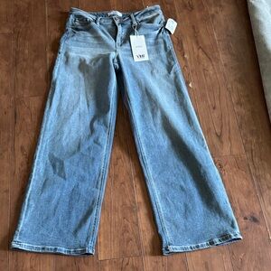 YMI size 11/30 Light Denim Blue Wide Leg Jeans w pockets.